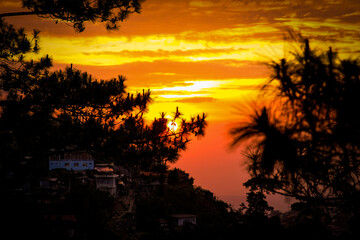 Sunset view of houses in Baguio City, Philippines.