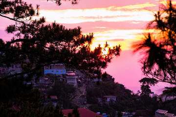 Sunset view of houses in Baguio City, Philippines.