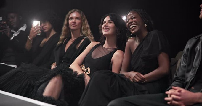 Happy people, audience and catwalk for fashion event, clothing inspiration or branding. Whisper, crowd or women in community with secret opinion, show or row for walkway, art or publicity on stage