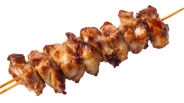 A skewer of chicken is sitting on a white background. The chicken is cooked and has a golden brown color