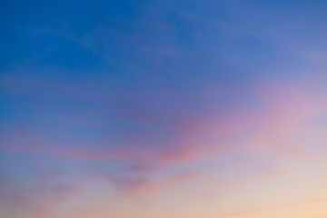 Colorful sky backdrop in the morning,Nature beautiful Light Sunset or sunrise sky,Sunset Sky Background in the Evening with Dramatic Dusk Clouds and Colorful Pink, Orange Sunlight on Blue Twilight sky