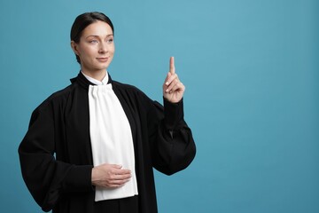 Judge on light blue background, space for text