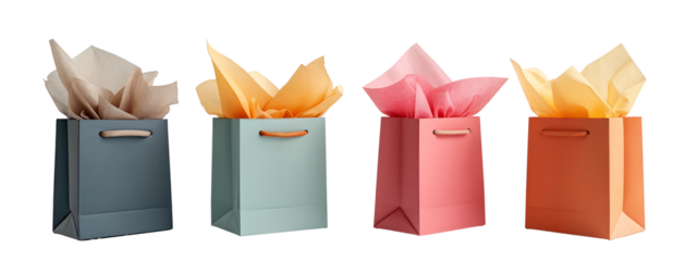 A group of four different colored paper bags with handles.