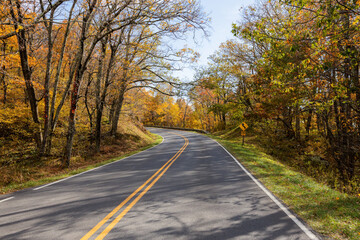 Fototapeta premium New England Autumn Colors Traveling Pathway