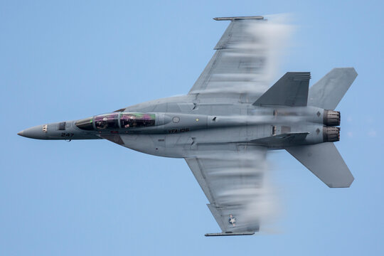 An F/A-18 Super Hornet performing at an airshow.