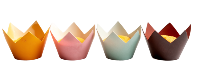 A group of four different colored paper cups sitting next to each other.