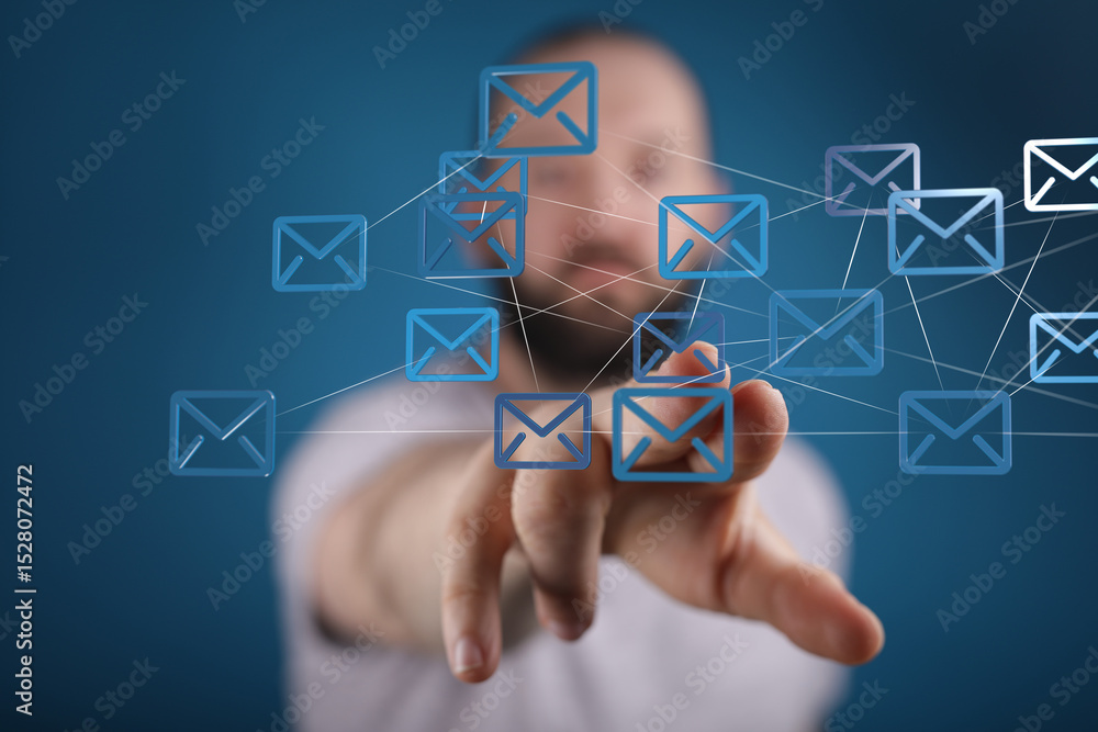 Poster stock photo of a man interacting with a network of digital email icons. perfect for communication, t