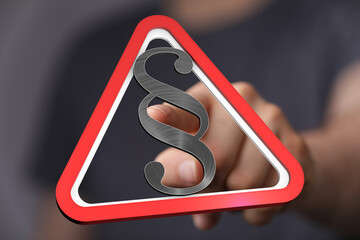 Hand pointing at a 3D warning sign with a paragraph symbol.  Legal, law, caution concept.