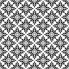 Flower geometric pattern. Seamless vector background. White and black ornament. Ornament for fabric, wallpaper, packaging. Decorative print.