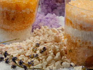 Aromatic relaxing herbal and floral sea bath salt in the jars, dried lavender for making aromatic...