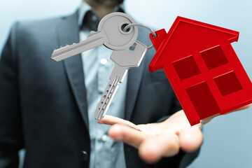 Image of a real estate agent offering house keys. Perfect for real estate, home buying, and...