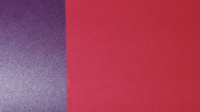 Vivid construction paper backgrounds in bold colors are gently animated by soft, natural shadows gliding across the surface, creating depth, movement, and visual warmth.
