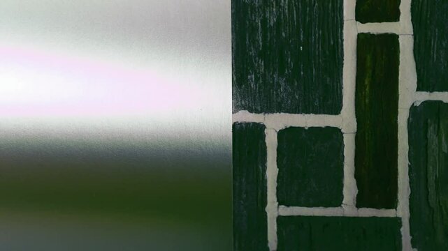 Vivid construction paper backgrounds in bold colors are gently animated by soft, natural shadows gliding across the surface, creating depth, movement, and visual warmth.
