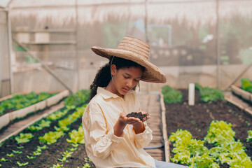 girl students test, research, land for agriculture, farming, household cultivation.
