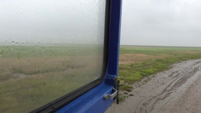 Mando, Denmark The view from a bus traversing the tidal plains to Mando Island over North Sea marshes. 
