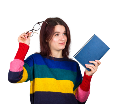 Casual student woman holding eyeglasses and a book thoughtful looking away. Educational concept