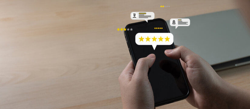 Customer Review. hand choosing five star button to review good rating for hotel on mobile phone, satisfaction, hotel and restaurant Review, digital marketing, good experience, product review concept