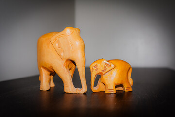 Two elephants wooden statues photo