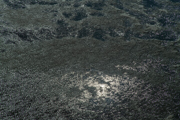 Naklejka premium high-angle view of the mud flat at the seaside