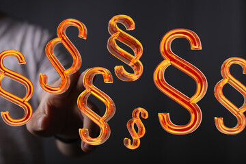 Abstract image of glowing paragraph symbols, ideal for legal, law, and justice related content.