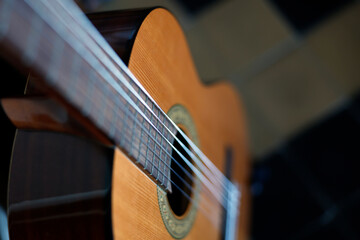 Fototapeta premium Musical instrument. Close-up of the strings of a guitar.