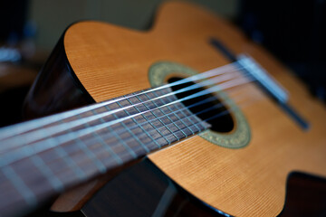 Fototapeta premium Musical instrument. Close-up of the strings of a guitar.