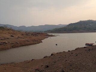 Mountain view and calm lake in evening light