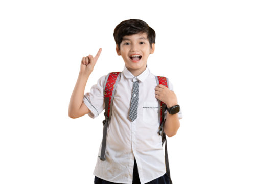 Portrait of Asian kid boy wearing school uniform and carying backpack posing on yellow background
