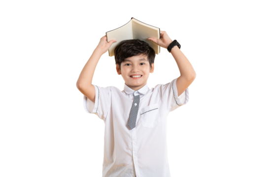 Portrait of Asian kid boy wearing school uniform and holding book posing on png background