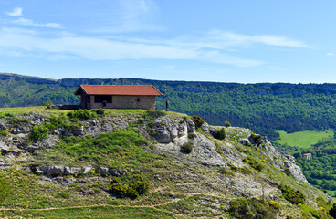Hikers at the Hermitage of San Lorenzo in the Valderejo Natural Park,