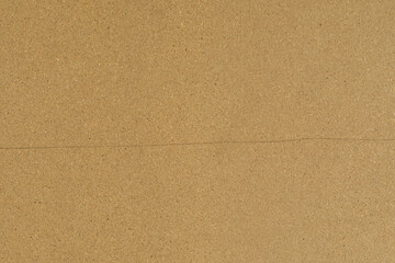 High-resolution image of a brown corkboard texture, perfect for backgrounds and presentations.