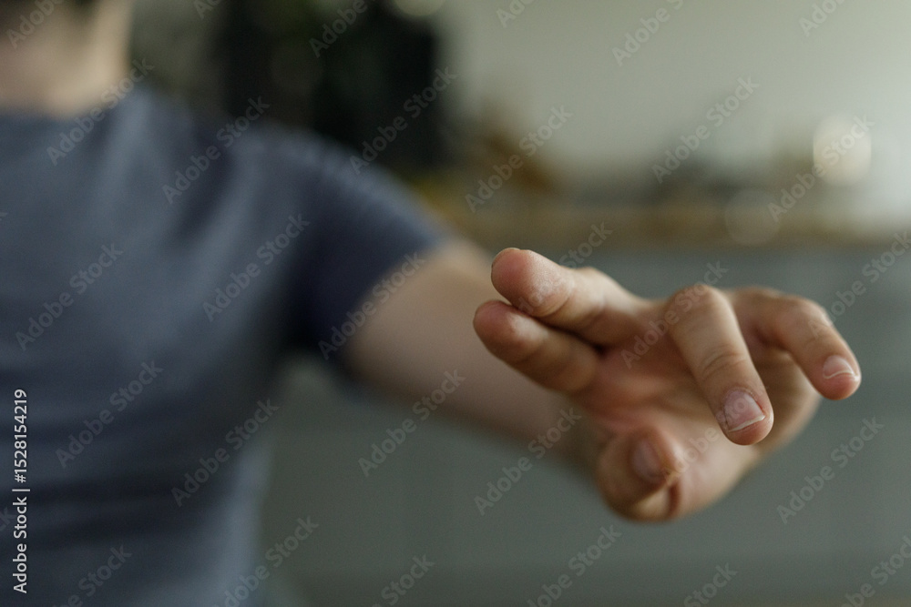 Poster close-up of a man's hand reaching out. perfect for concepts of connection, help, or interaction.