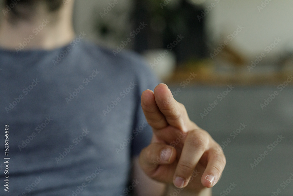 Poster close-up image of a man's hand gesturing, perfect for concepts of interaction, technology, or commun
