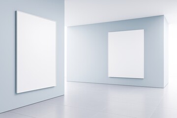 Blank white posters on light blue walls in a clean, modern interior room with tiled floor and soft lighting, minimalist space for branding mockup.