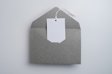 Paper envelopes on a light background. New mail, write a message. Send and receive mail. Postal delivery service. Empty envelope, empty space. Communication with people, paperwork. Envelope close-up
