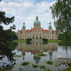 Hannover City Hall is a historic landmark by the serene Lake, showcasing beautiful architecture