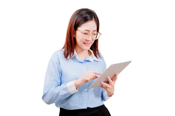 Asian young beautiful woman in glasses and a striped shirt is using a tablet, smiling as she...