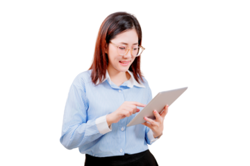 Asian young beautiful woman in glasses and a striped shirt is using a tablet, smiling as she interacts with the device.
