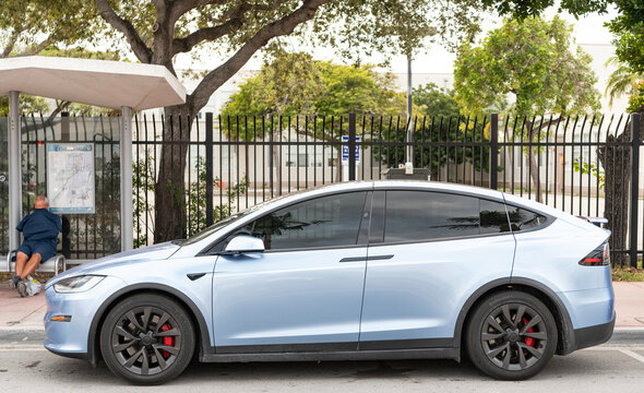 Miami, Florida, USA - November 18, 2024: Tesla Model X 2022 electric car. Luxury electric car of Tesla Model X type. Car of Tesla Model X parked outdoor. Tesla Model XG, side view.