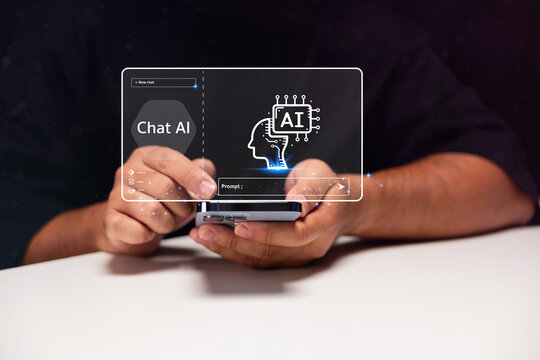 A person uses a smartphone with a digital overlay showing "Chat AI" and an AI brain icon, symbolizing artificial intelligence interaction via mobile technology. - Powered by Adobe