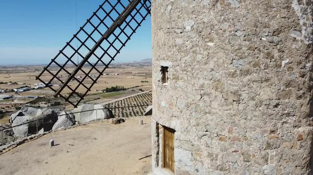 Drone Ascending Alongside the Windmill in Las Ventas with Pe&ntilde;a Aguilera, Toledo, Castilla-La Mancha - 685
