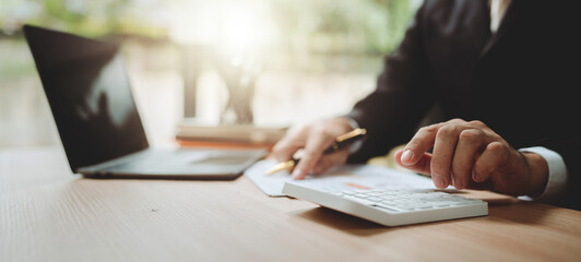 Financial professionals are calculating personal taxes for their clients.