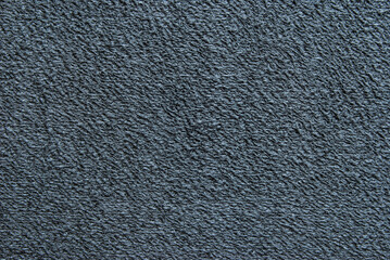 Soft black fluffy fabric texture or background