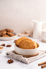 Homemade peanut or almond butter cookies or oatmeal cookies on white kitchen background. High quality photo