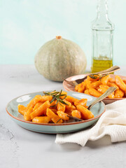 Pumpkin recipe homemade gnocchi on pastel color background
