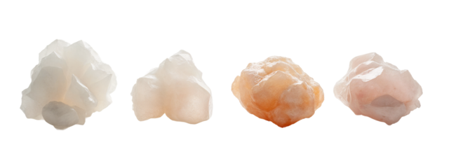 A group of four different colored rocks