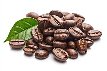 Fototapeta premium A pile of dark roasted coffee beans with a single green leaf, isolated on white background