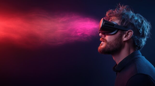 A man wearing a virtual reality headset experiences vivid light effects emanating from it, illustrating the future of technology and immersive experiences in digital life.