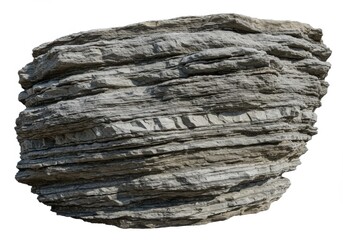 A layered sedimentary rock formation against a plain white background space