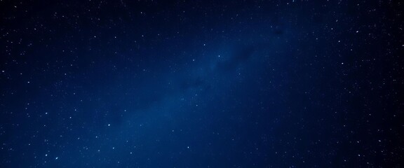 Obraz premium Vast, deep blue night sky ablaze with countless glowing stars, cosmic dust visible, ethereal, sky
